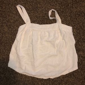 Cream tank with side buttons